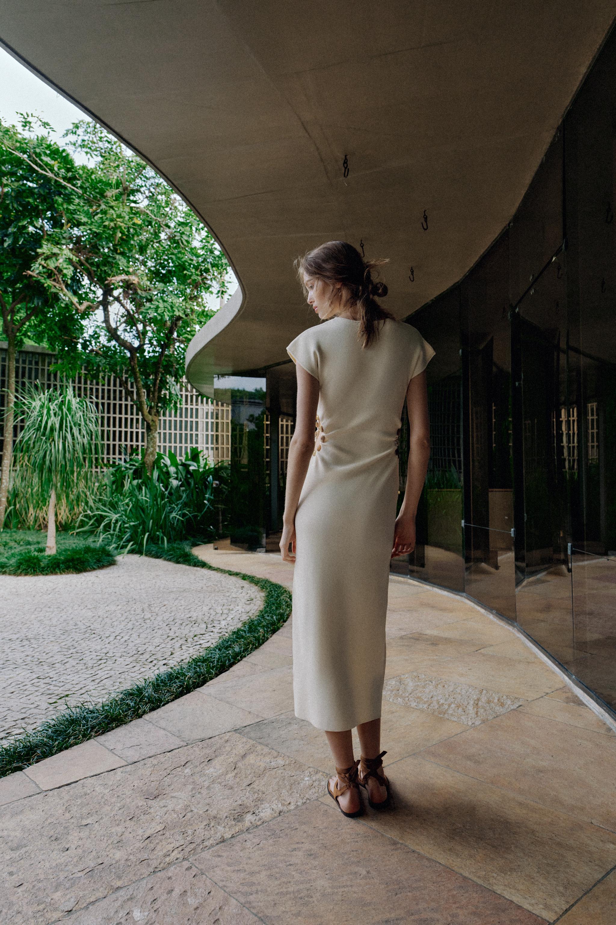 KNIT CUT OUT DRESS WITH BALLS